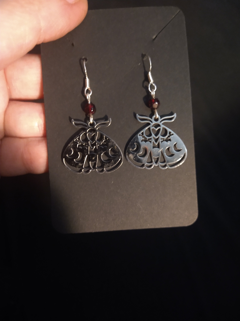 Silver Moth Cutout Dangle Earrings with Garnet Bead